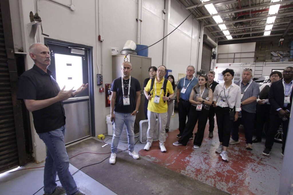 Mark Gilbert presenting in a high bay to the ASCE conference attendees